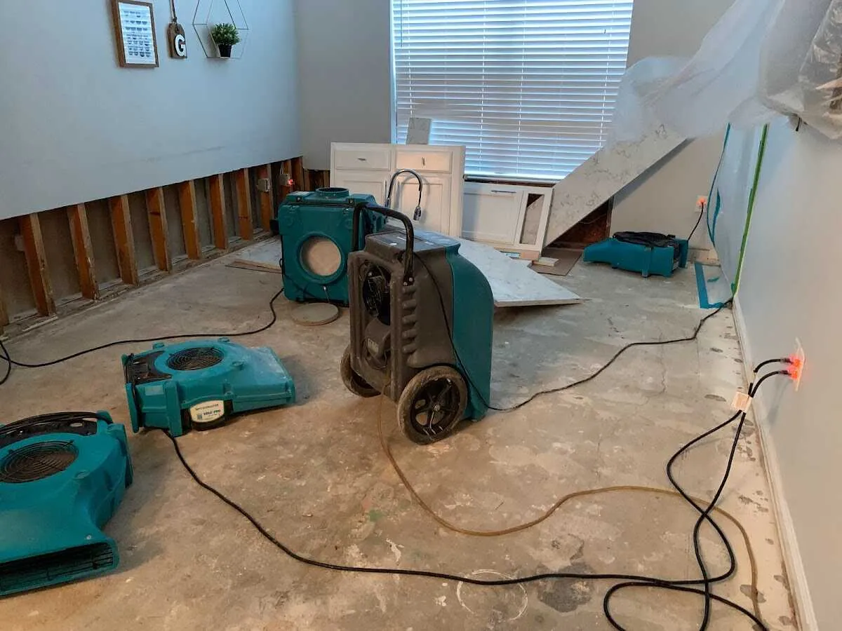 Dehumidifier in flood-cut room for Water Damage Restoration in Fort Valley